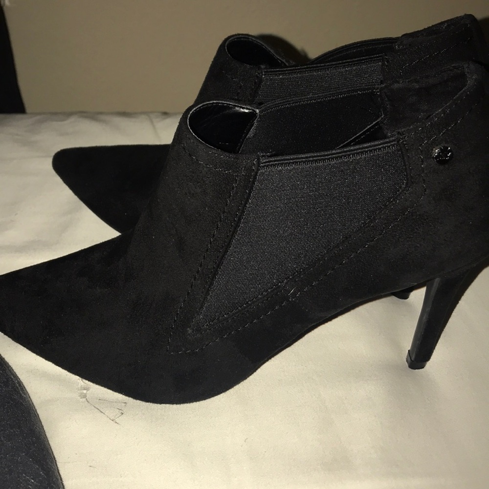 Black high heel booties never worn